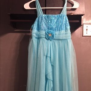 a beautiful blue sparkly dress